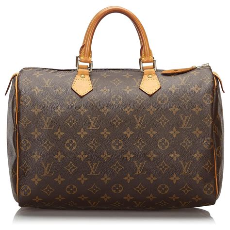 brown leather louis vuitton purse|louis vuitton brown suede bag.